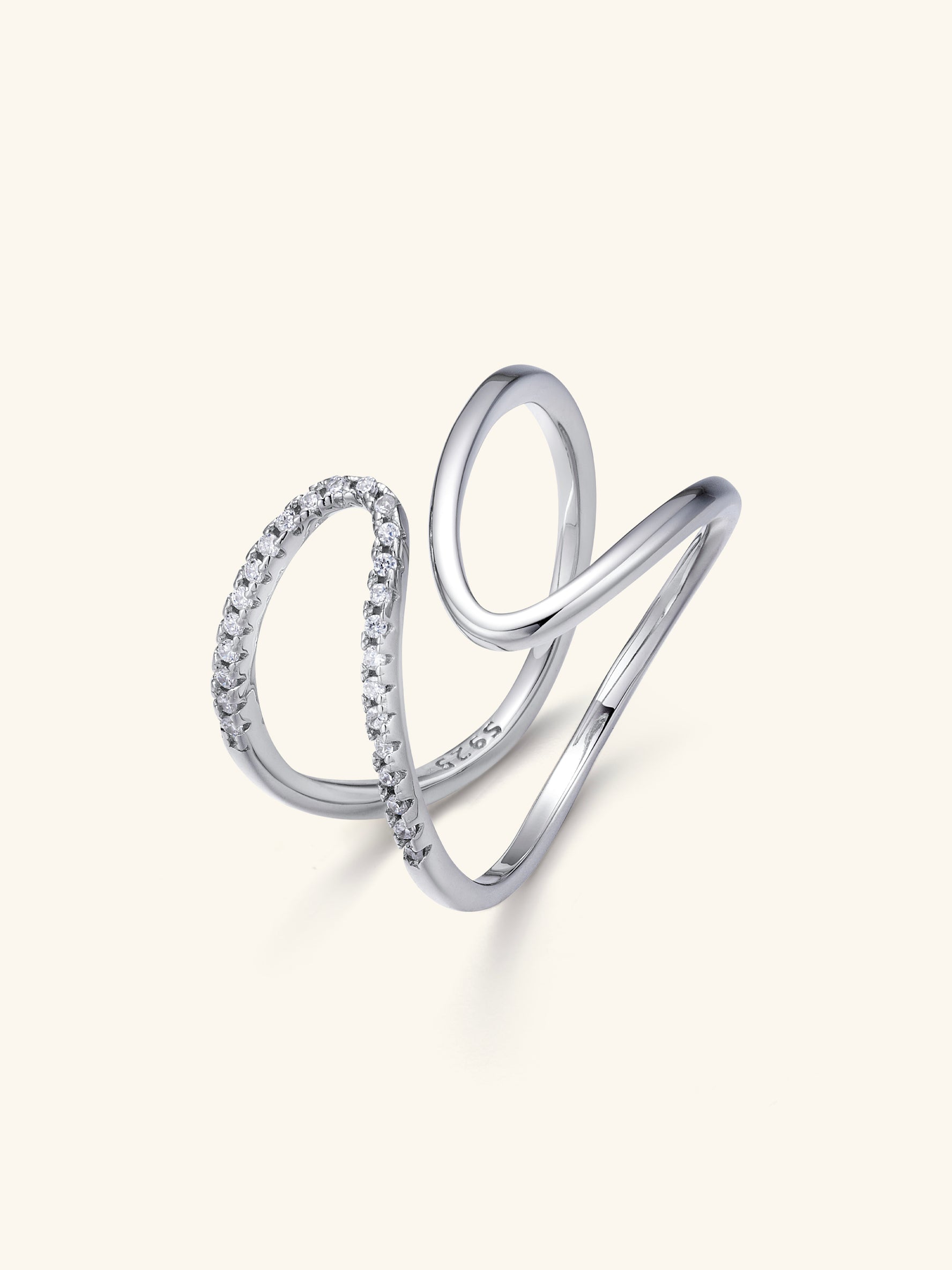 Lira Ring – Sculptural Curves in Gold and Silver Elegance