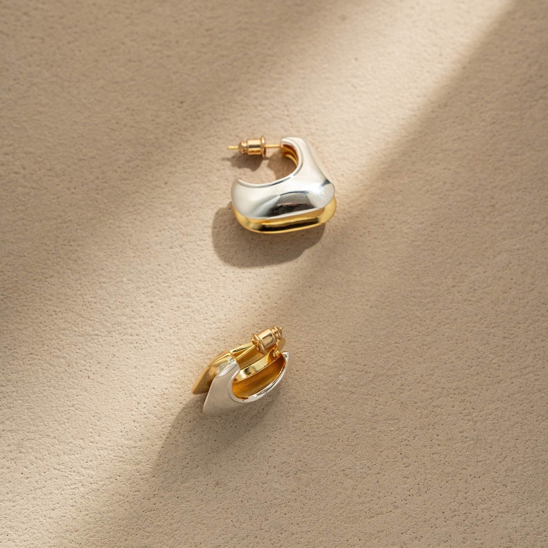 The Boundary of Day and Night Dual-Tone Earrings
